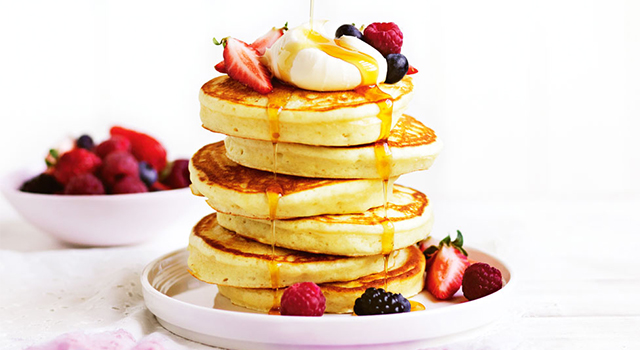 basic pancakes with fresh fruits on top